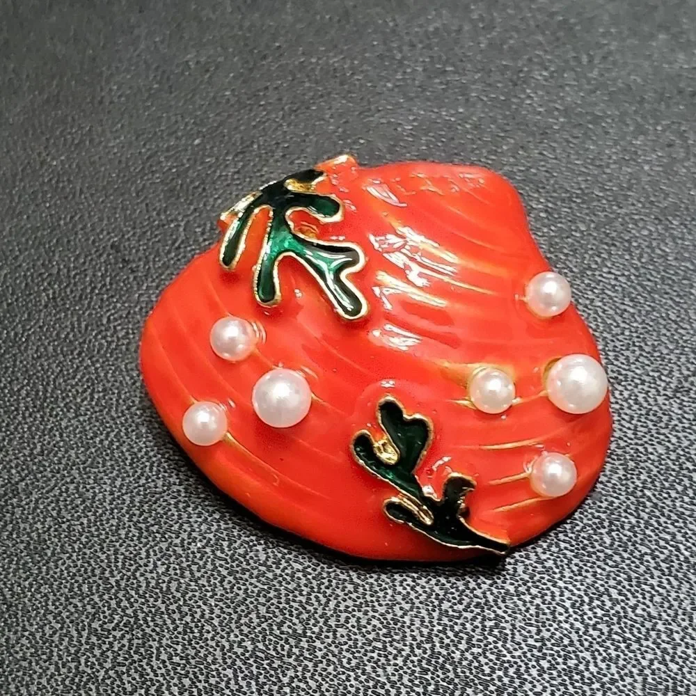 Gold tone orange enamel shell brooch faux pearl